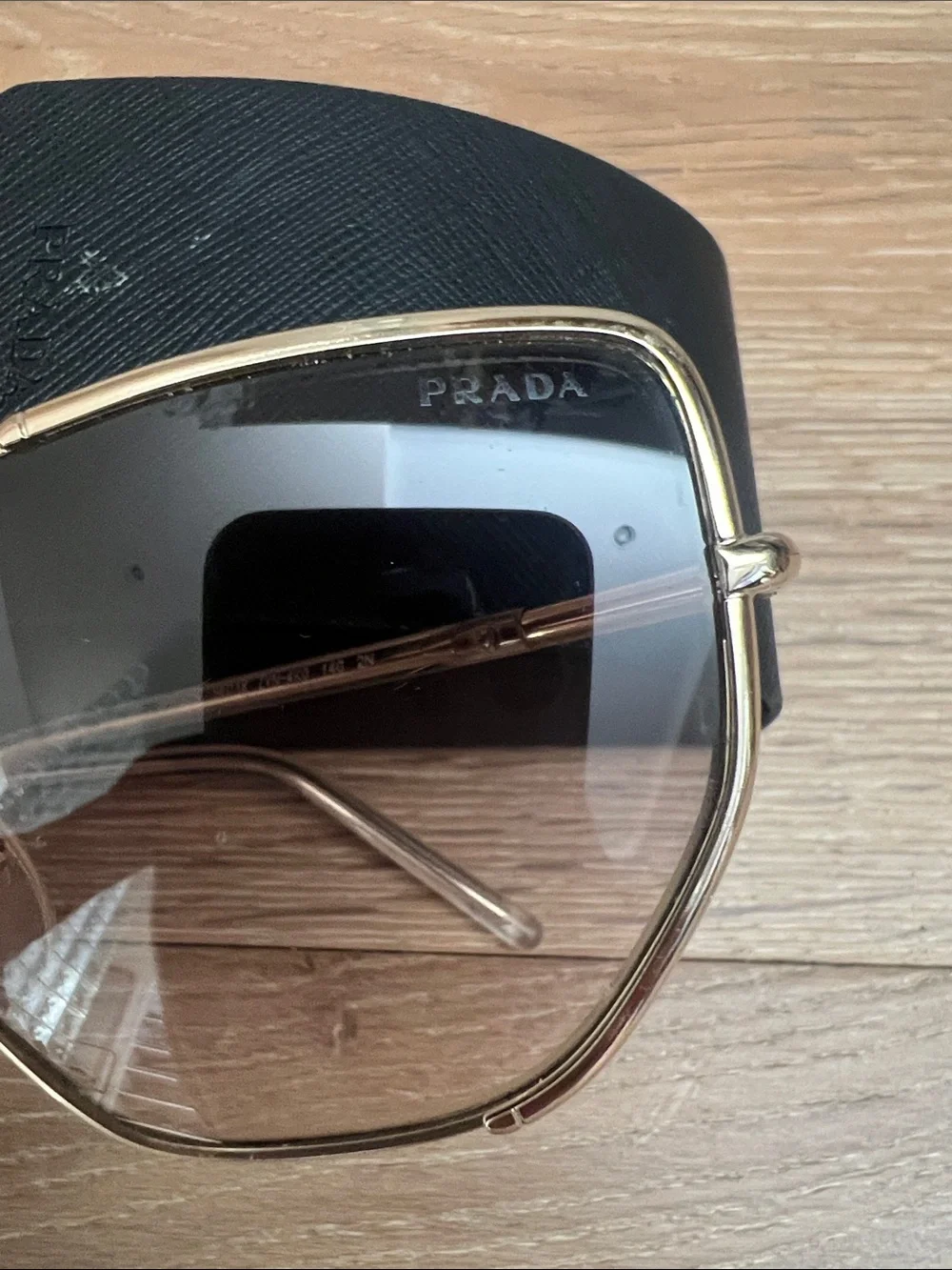 Prada Cat Eye Gold Frame Sunglasses with Brown Gradient Lenses
